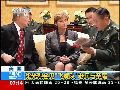 梁光烈会见“飞虎队”老兵与亲属