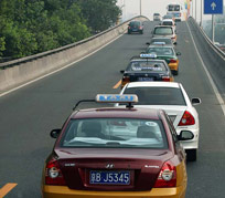 北京机动车：在限行争议中前行