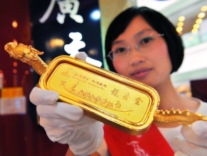 亚运主题收藏品开卖 立体龙舟金条标价40万(图)